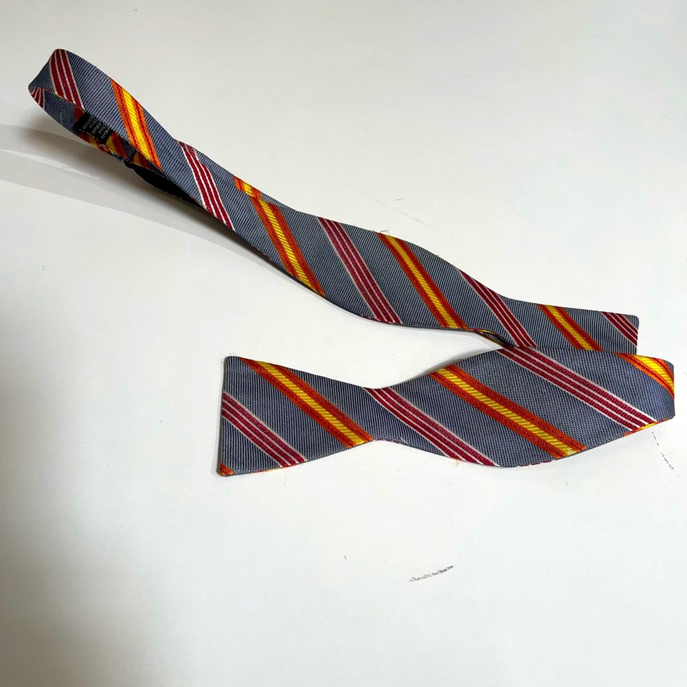 Very cool Grey Bow Tie with Orange,Red, & White Stripes